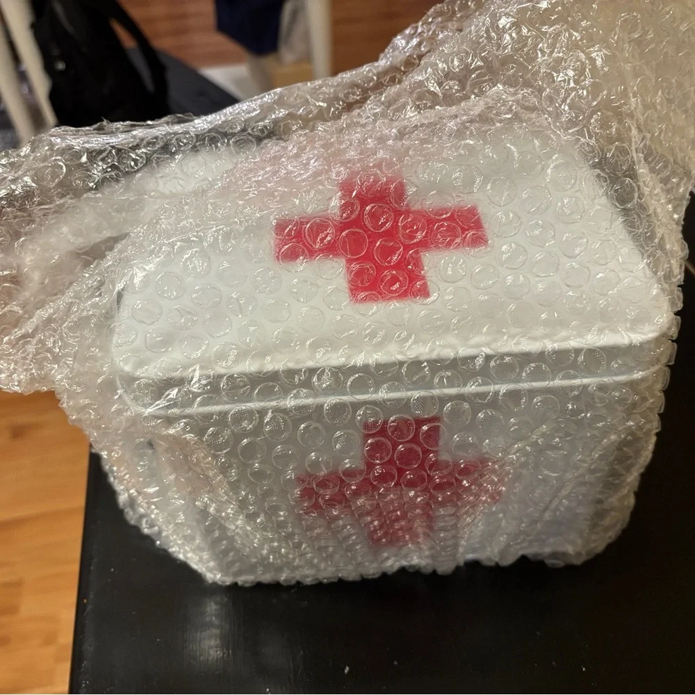 White First Aid Tin with Red Cross
